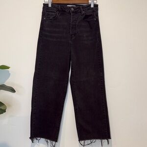 Carly Jean Los Angeles Women’s Black Frayed Hem Jeans. Stretchy. Button fly.